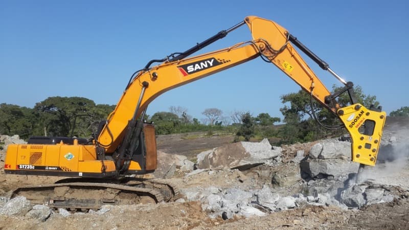 Heavy Hydraulic Excavator with Rock Breaker (21 to 38 Tons) - Tracked Heavy Excavator with Rock Breaker Hammer hired by Captain Investments Limited Zambia